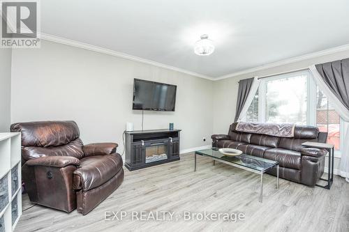 27 Huntington Court, Brampton, ON - Indoor Photo Showing Living Room With Fireplace