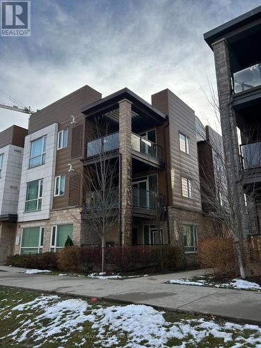 206 - 2370 Khalsa Gate, Oakville, ON - Outdoor With Balcony With Facade