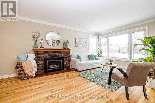 813 Weston Drive, Ottawa, ON - Indoor Photo Showing Living Room With Fireplace