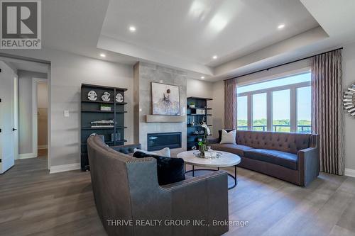 1065 Meadowlark Ridge, London, ON - Indoor Photo Showing Living Room With Fireplace