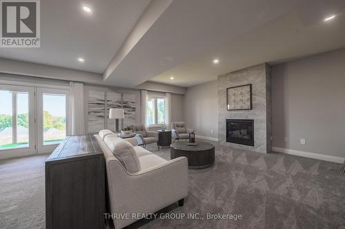 1065 Meadowlark Ridge, London, ON - Indoor Photo Showing Living Room With Fireplace