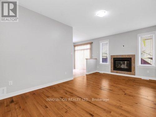 638 Moorpark Avenue, Ottawa, ON - Indoor Photo Showing Living Room With Fireplace