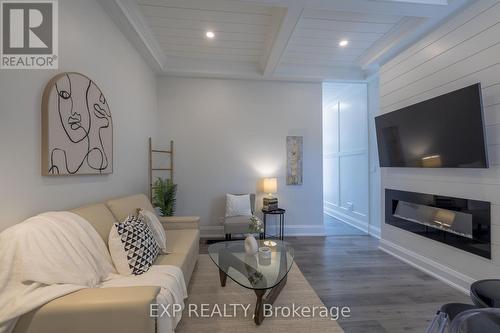 5 Florence Street, Hamilton, ON - Indoor Photo Showing Living Room With Fireplace