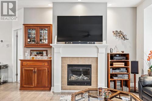 38 - 2295 Kains Road, London, ON - Indoor Photo Showing Living Room With Fireplace