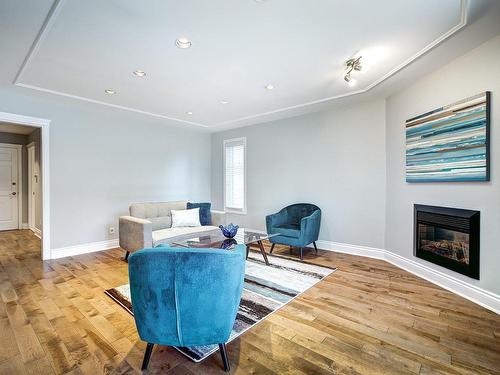 Family room - 310 Henri-Jarry Street, Beaconsfield, QC - Indoor Photo Showing Living Room With Fireplace