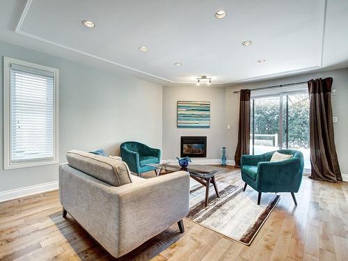 Family room - 310 Henri-Jarry Street, Beaconsfield, QC - Indoor Photo Showing Living Room With Fireplace