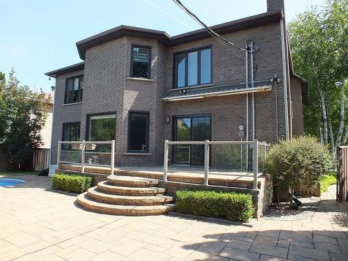 Back facade - 310 Henri-Jarry Street, Beaconsfield, QC - Outdoor With In Ground Pool