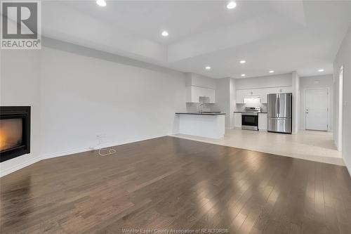 6071 Livingstone Street, Windsor, ON - Indoor Photo Showing Other Room With Fireplace