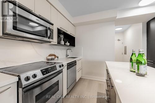 2505 - 21 Carlton Street, Toronto, ON - Indoor Photo Showing Kitchen With Upgraded Kitchen