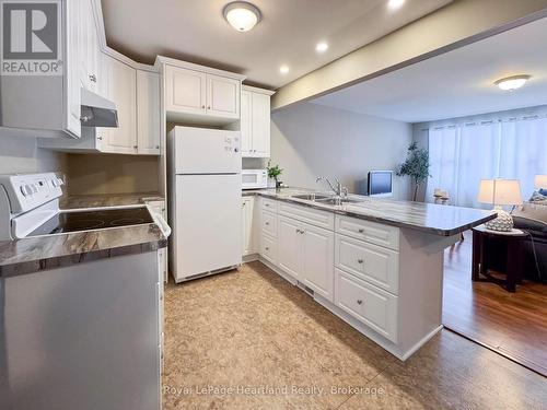 126 Sanders Street E, South Huron (Exeter), ON - Indoor Photo Showing Kitchen With Double Sink