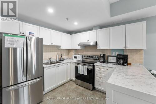 404 - 125 Third Street, Cobourg, ON - Indoor Photo Showing Kitchen With Double Sink