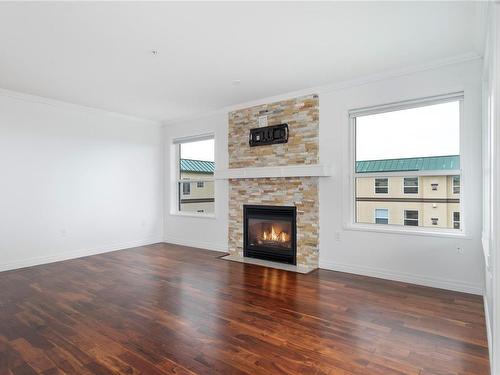 413-280 Dogwood St South, Campbell River, BC - Indoor Photo Showing Living Room With Fireplace