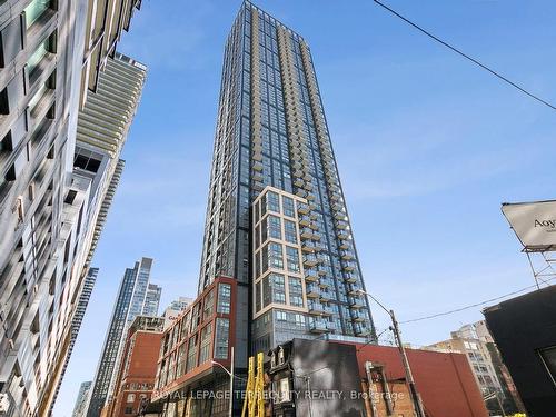 1902-108 Peter St, Toronto, ON - Outdoor With Facade