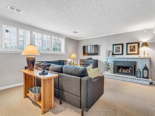 23 Shamokin Dr, Toronto, ON - Indoor Photo Showing Living Room With Fireplace