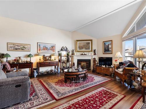 310-10459 Resthaven Dr, Sidney, BC - Indoor Photo Showing Living Room With Fireplace