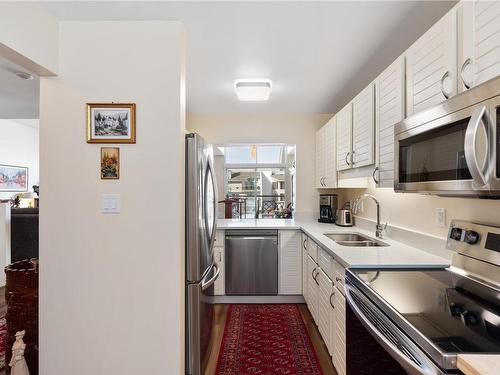 310-10459 Resthaven Dr, Sidney, BC - Indoor Photo Showing Kitchen With Double Sink