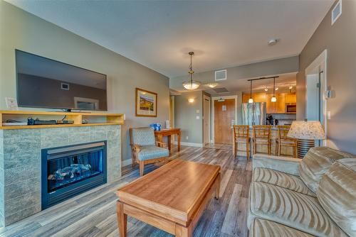 241-4205 Gellatly Road, West Kelowna, BC - Indoor Photo Showing Living Room With Fireplace