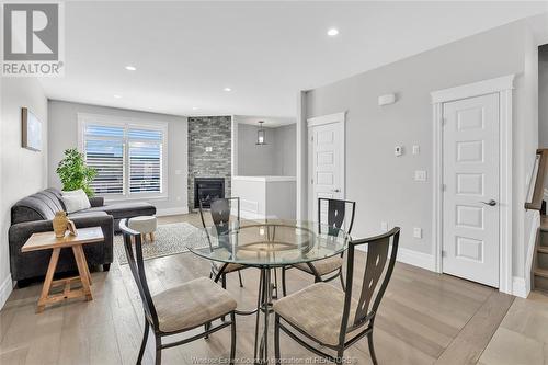 729 Brownstone Drive, Lakeshore, ON - Indoor Photo Showing Dining Room With Fireplace