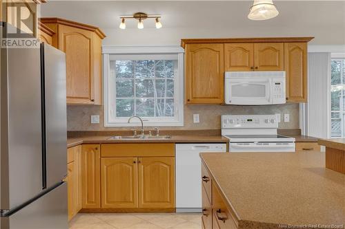 25 Isaac Street, Rothesay, NB - Indoor Photo Showing Kitchen With Double Sink