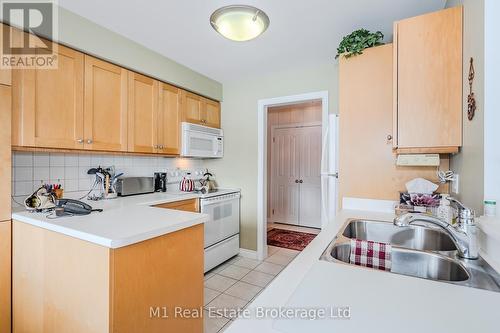 302 - 43 Caroline Street N, Waterloo, ON - Indoor Photo Showing Kitchen With Double Sink