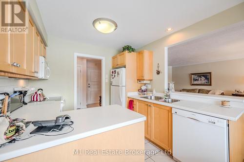 302 - 43 Caroline Street N, Waterloo, ON - Indoor Photo Showing Kitchen With Double Sink