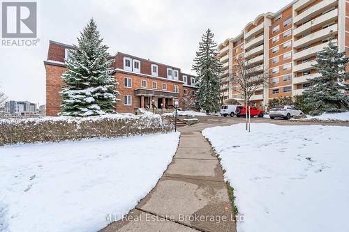 302 - 43 Caroline Street N, Waterloo, ON - Outdoor With Facade