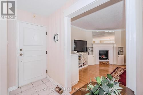 302 - 43 Caroline Street N, Waterloo, ON - Indoor Photo Showing Other Room With Fireplace