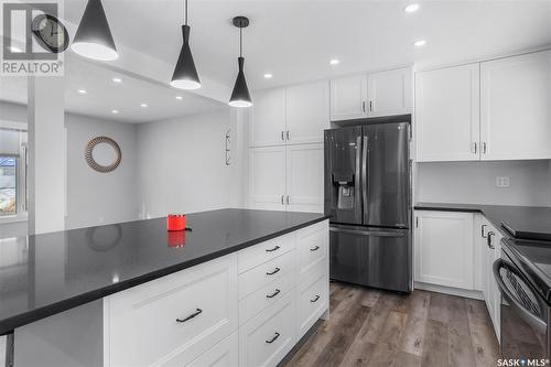 2417 Clarence Avenue S, Saskatoon, SK - Indoor Photo Showing Kitchen With Stainless Steel Kitchen With Upgraded Kitchen