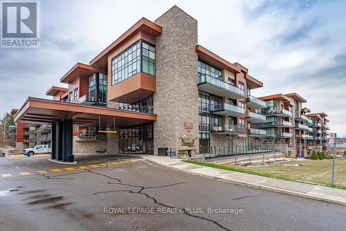 465 - 1575 Lakeshore Road W, Mississauga, ON - Outdoor With Balcony With Facade