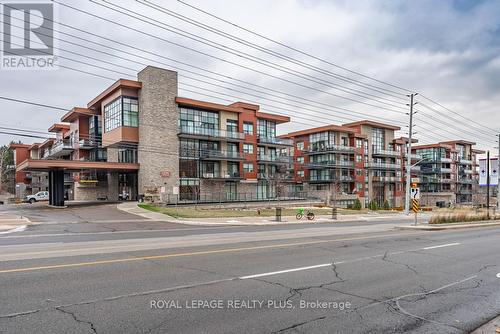 465 - 1575 Lakeshore Road W, Mississauga, ON - Outdoor With Balcony With Facade