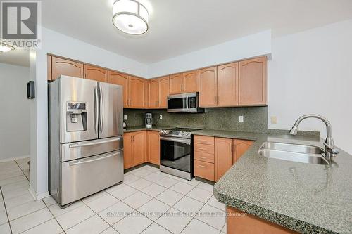 2077 Frontier Drive, Oakville, ON - Indoor Photo Showing Kitchen With Stainless Steel Kitchen With Double Sink