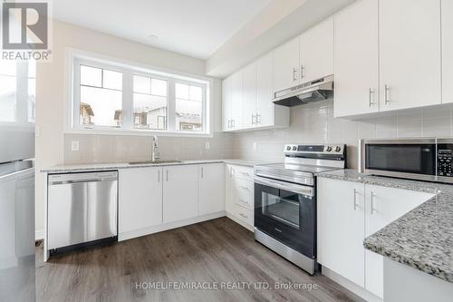 70 - 10 Birmingham Drive E, Cambridge, ON - Indoor Photo Showing Kitchen With Stainless Steel Kitchen