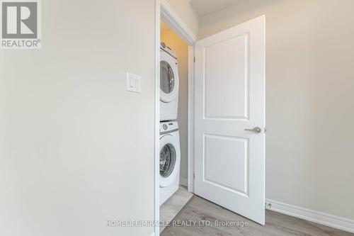 70 - 10 Birmingham Drive E, Cambridge, ON - Indoor Photo Showing Laundry Room