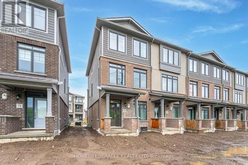 70 - 10 Birmingham Drive E, Cambridge, ON - Outdoor With Facade