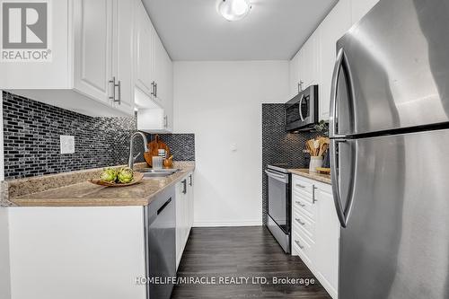 12 - 293 Limeridge Road W, Hamilton, ON - Indoor Photo Showing Kitchen With Stainless Steel Kitchen With Double Sink With Upgraded Kitchen