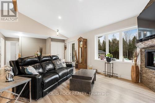 1410 Du Golf Road, Clarence-Rockland, ON - Indoor Photo Showing Living Room With Fireplace