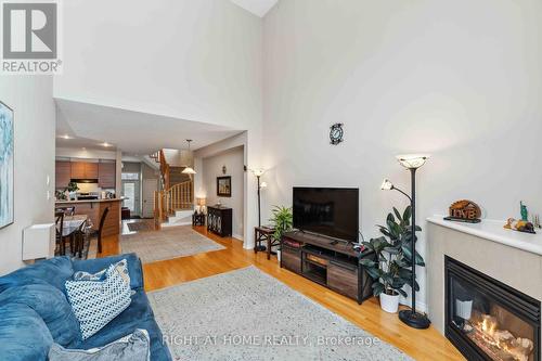 300 Cooks Mill Crescent, Ottawa, ON - Indoor Photo Showing Living Room With Fireplace