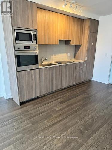 708 - 11 Wellesley Street, Toronto, ON - Indoor Photo Showing Kitchen