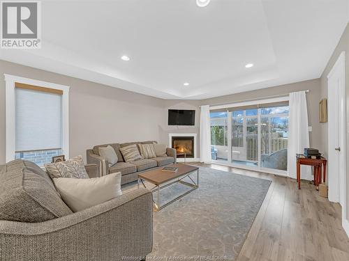 11 Cranberry, Kingsville, ON - Indoor Photo Showing Living Room With Fireplace