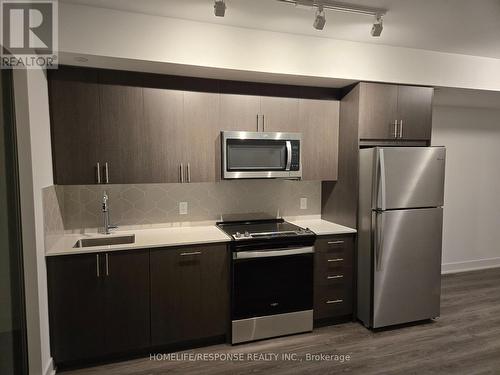 604 - 2545 Simcoe Street N, Oshawa, ON - Indoor Photo Showing Kitchen With Stainless Steel Kitchen