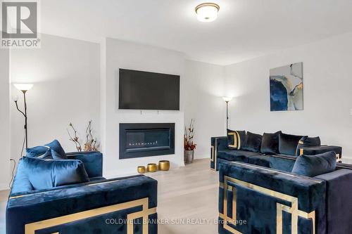 3716 Lakepoint Drive, Orillia, ON - Indoor Photo Showing Living Room With Fireplace