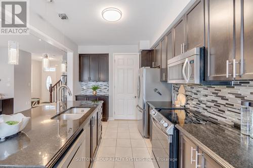 354 Powadiuk Place, Milton, ON - Indoor Photo Showing Kitchen With Double Sink With Upgraded Kitchen