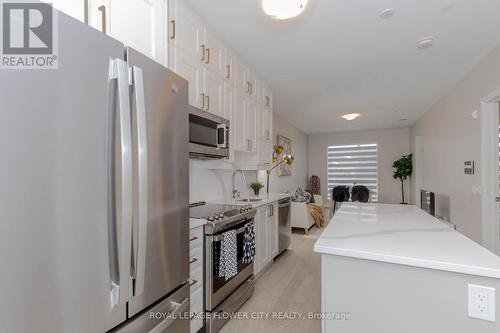 203 - 460 Gordon Krantz Avenue, Milton, ON - Indoor Photo Showing Kitchen With Stainless Steel Kitchen