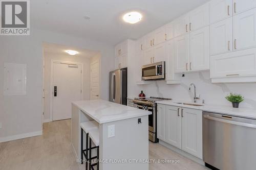 203 - 460 Gordon Krantz Avenue, Milton, ON - Indoor Photo Showing Kitchen With Stainless Steel Kitchen With Upgraded Kitchen