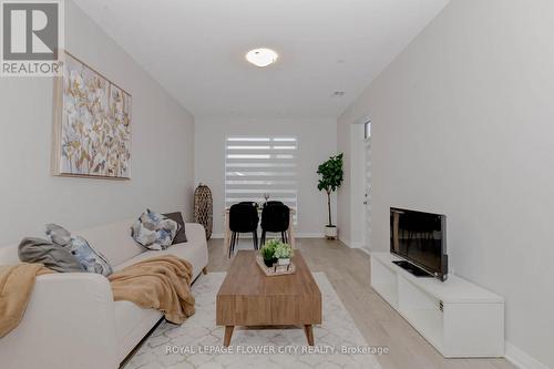 203 - 460 Gordon Krantz Avenue, Milton, ON - Indoor Photo Showing Living Room