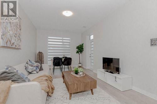 203 - 460 Gordon Krantz Avenue, Milton, ON - Indoor Photo Showing Living Room