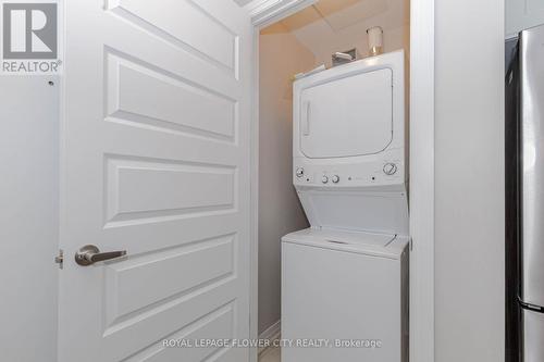 203 - 460 Gordon Krantz Avenue, Milton, ON - Indoor Photo Showing Laundry Room