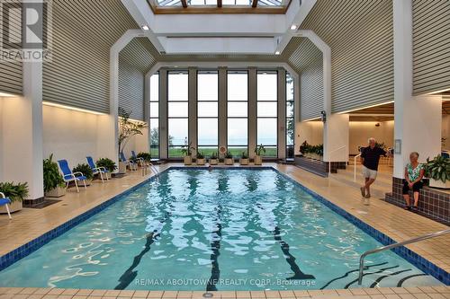 1006 - 2180 Marine Drive, Oakville, ON - Indoor Photo Showing Other Room With In Ground Pool