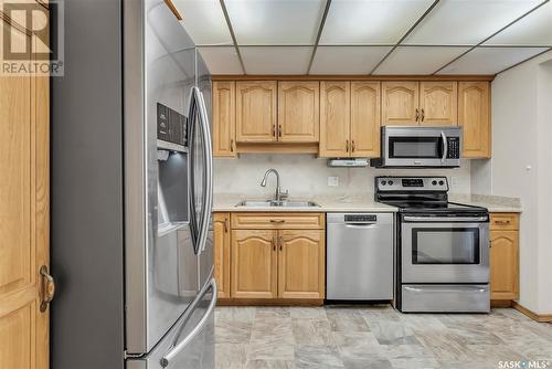 337 2301 Adelaide Street E, Saskatoon, SK - Indoor Photo Showing Kitchen With Stainless Steel Kitchen With Double Sink