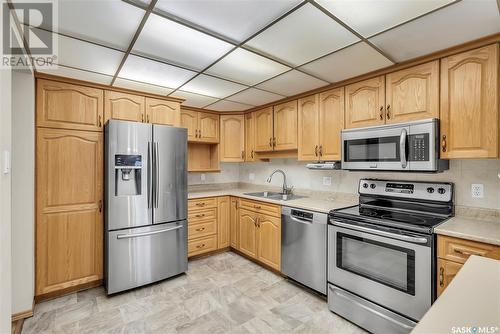 337 2301 Adelaide Street E, Saskatoon, SK - Indoor Photo Showing Kitchen With Stainless Steel Kitchen With Double Sink